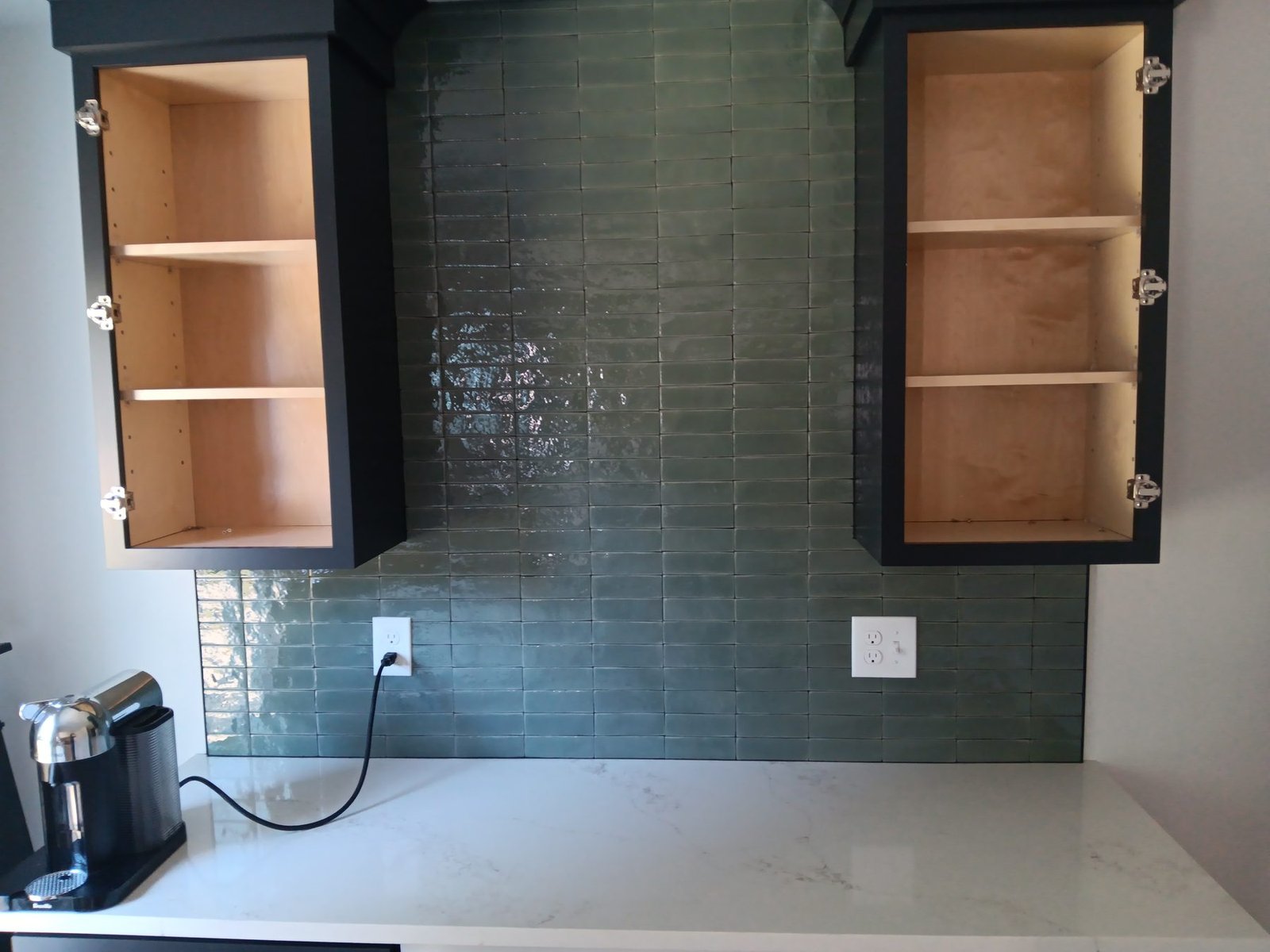 Green glazed subway backsplash
