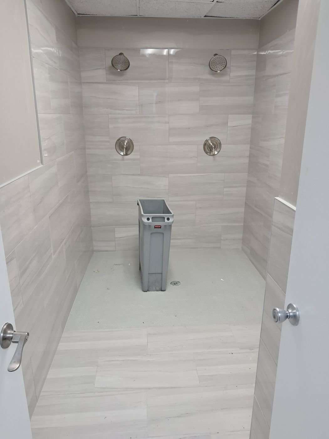 Commercial multi-head shower room