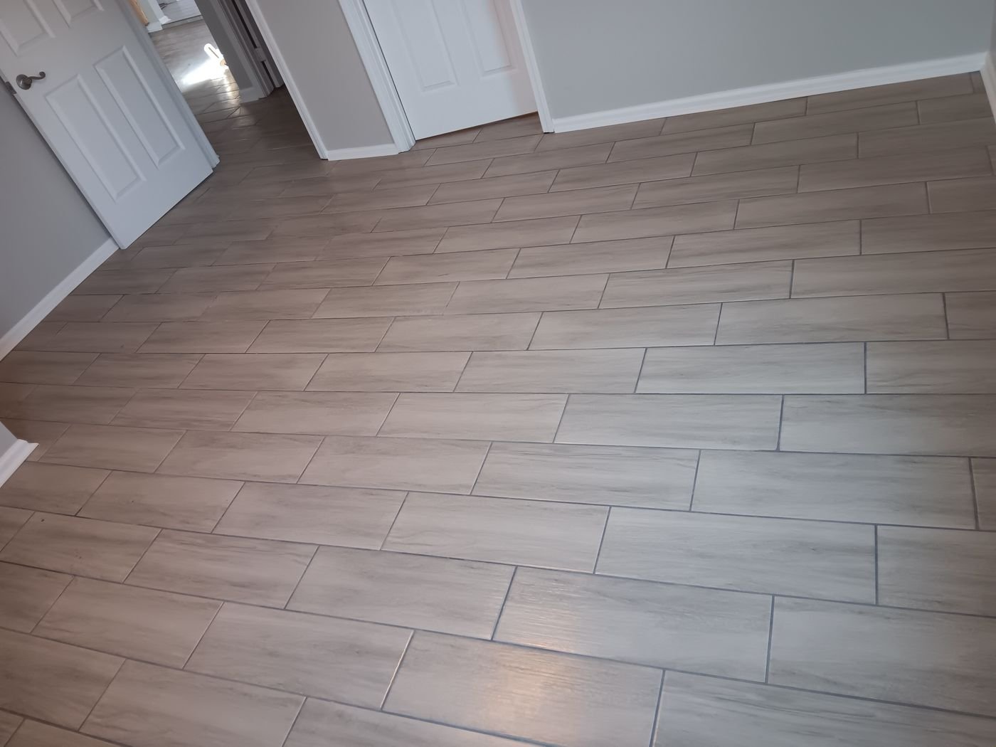 Wood-look tile through living space